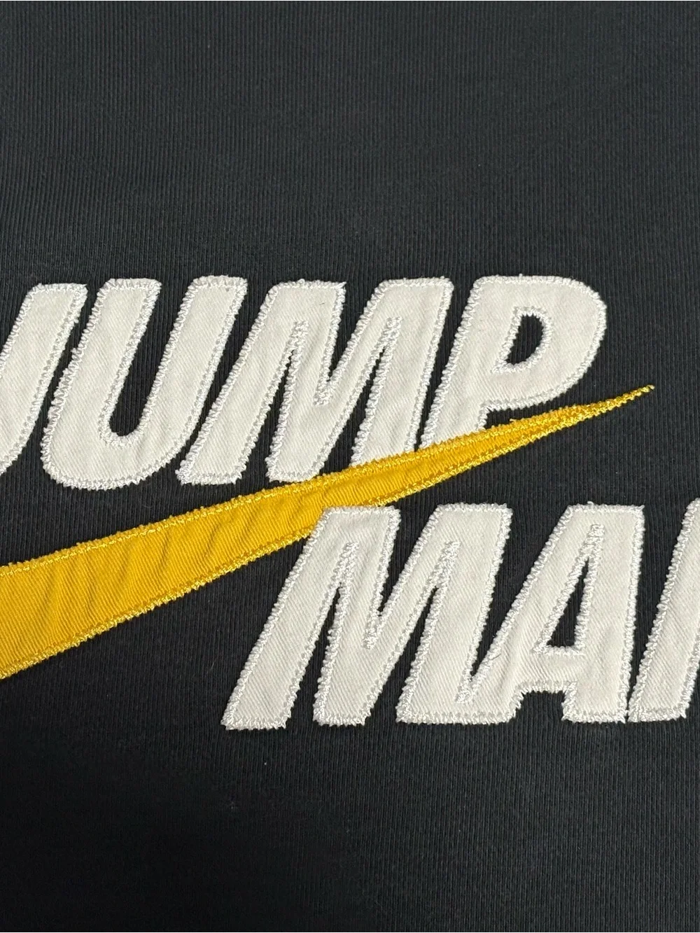 Jordan Black Crewneck Sweater with Gold Accents